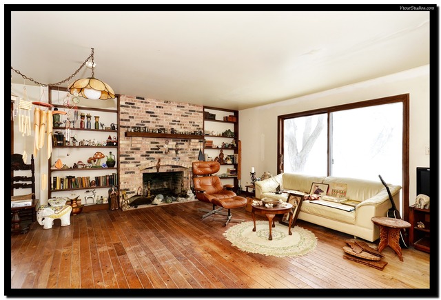 38W709 Seavey Road Batavia, IL 60510 - Photo 7 of 21 a living room with furniture a fireplace and large windows