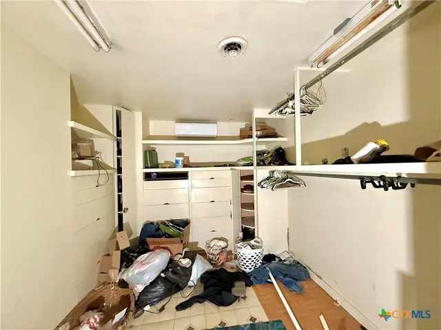a room with storage and utility