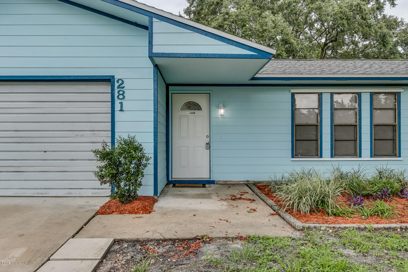 281 Riley Avenue Northeast Palm Bay, FL 32907 - Photo 2 of 15 02_281Riley0428_mls
