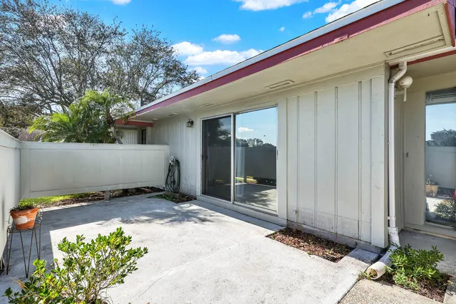 a view of a back yard of the house