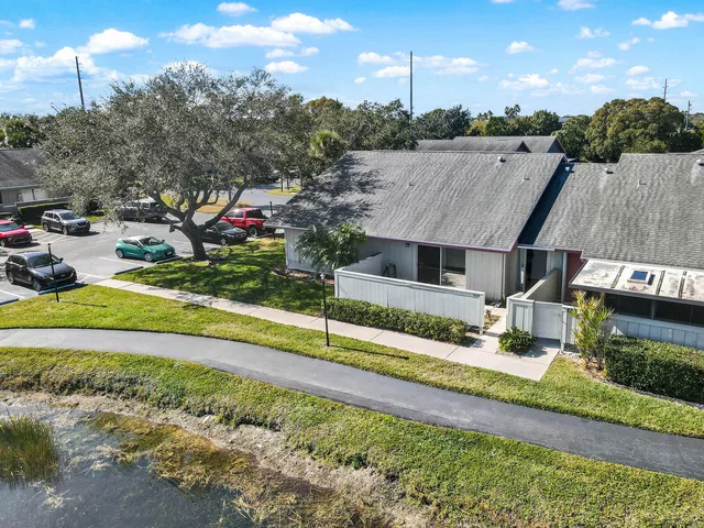 a view of a house with a big yard
