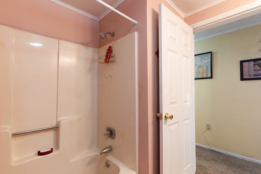 116 Spencer Road Oakham, MA 01068 - Photo 14 of 40 a bathroom with a bathtub and a shower