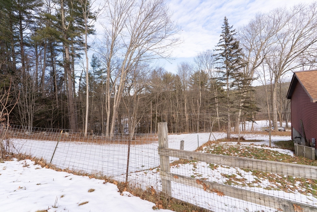 116 Spencer Road Oakham, MA 01068 - Photo 35 of 40 a view of a building with a yard