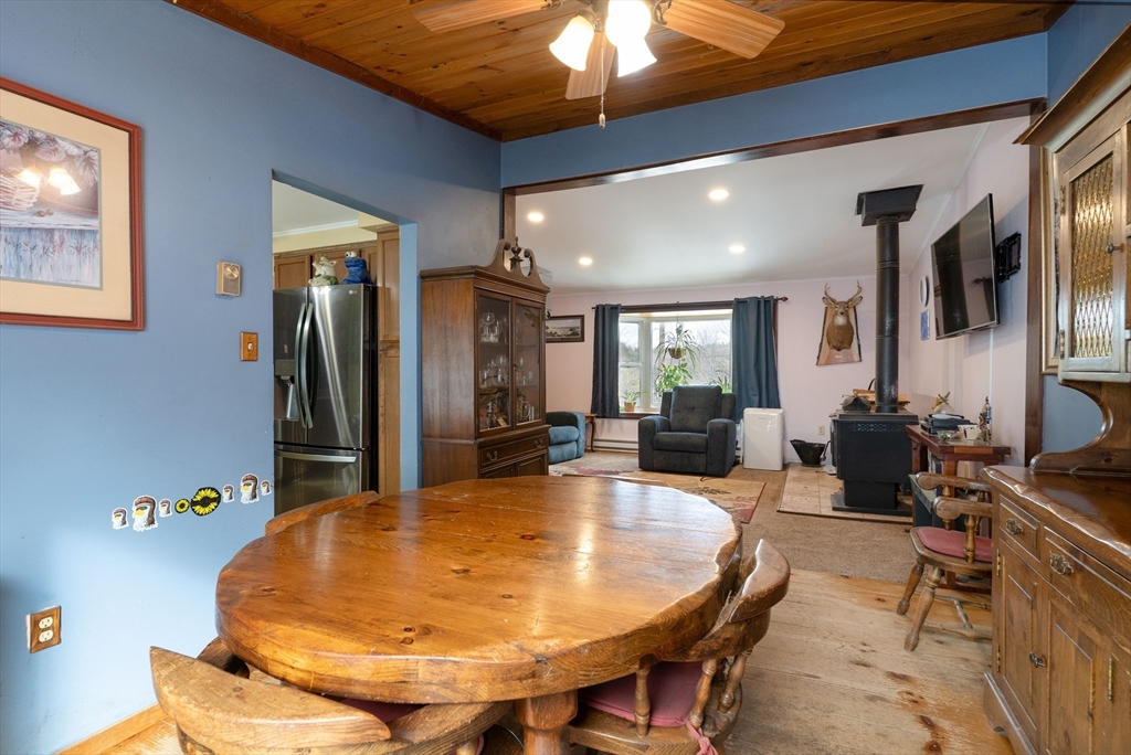 116 Spencer Road Oakham, MA 01068 - Photo 9 of 40 a living room with dining table