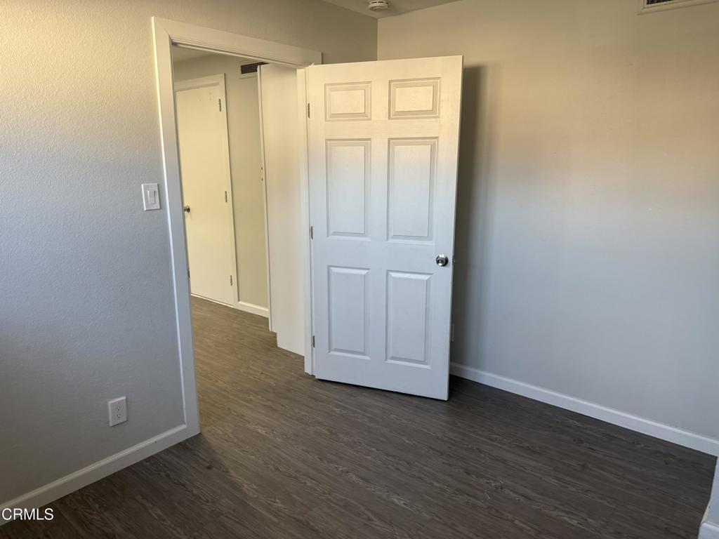 600 Central Street Fillmore, CA 93015 - Photo 11 of 13 an empty room with wooden floor and closet area