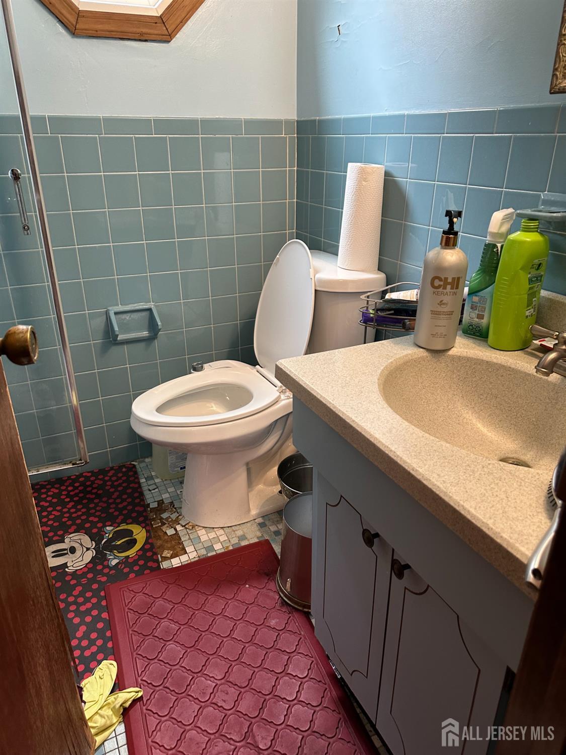 16 Hershey Road East Brunswick, NJ 08816 - Photo 12 of 15 a bathroom with a toilet and a sink