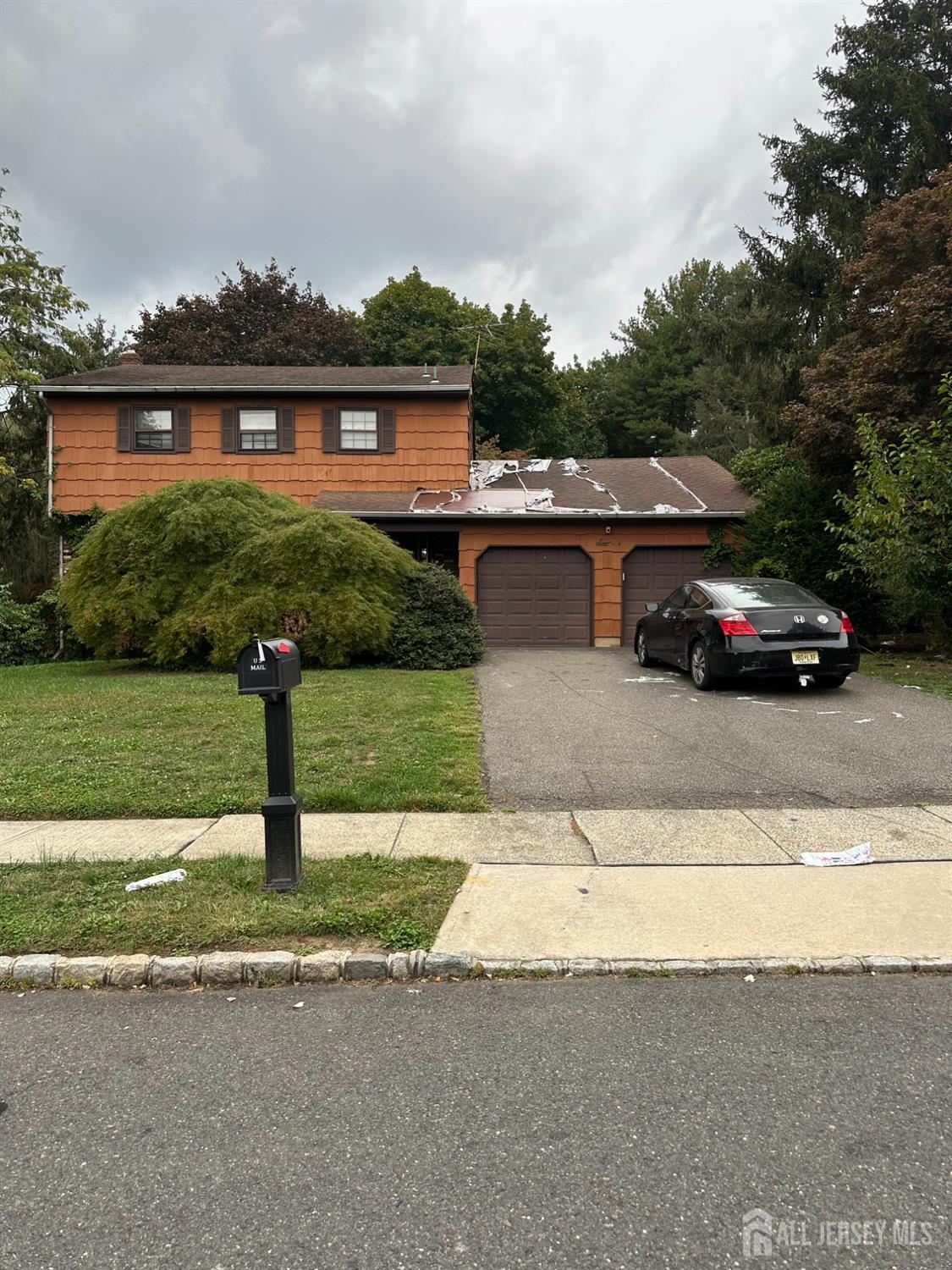 16 Hershey Road East Brunswick, NJ 08816 - Photo 2 of 15 a front view of a house with garden