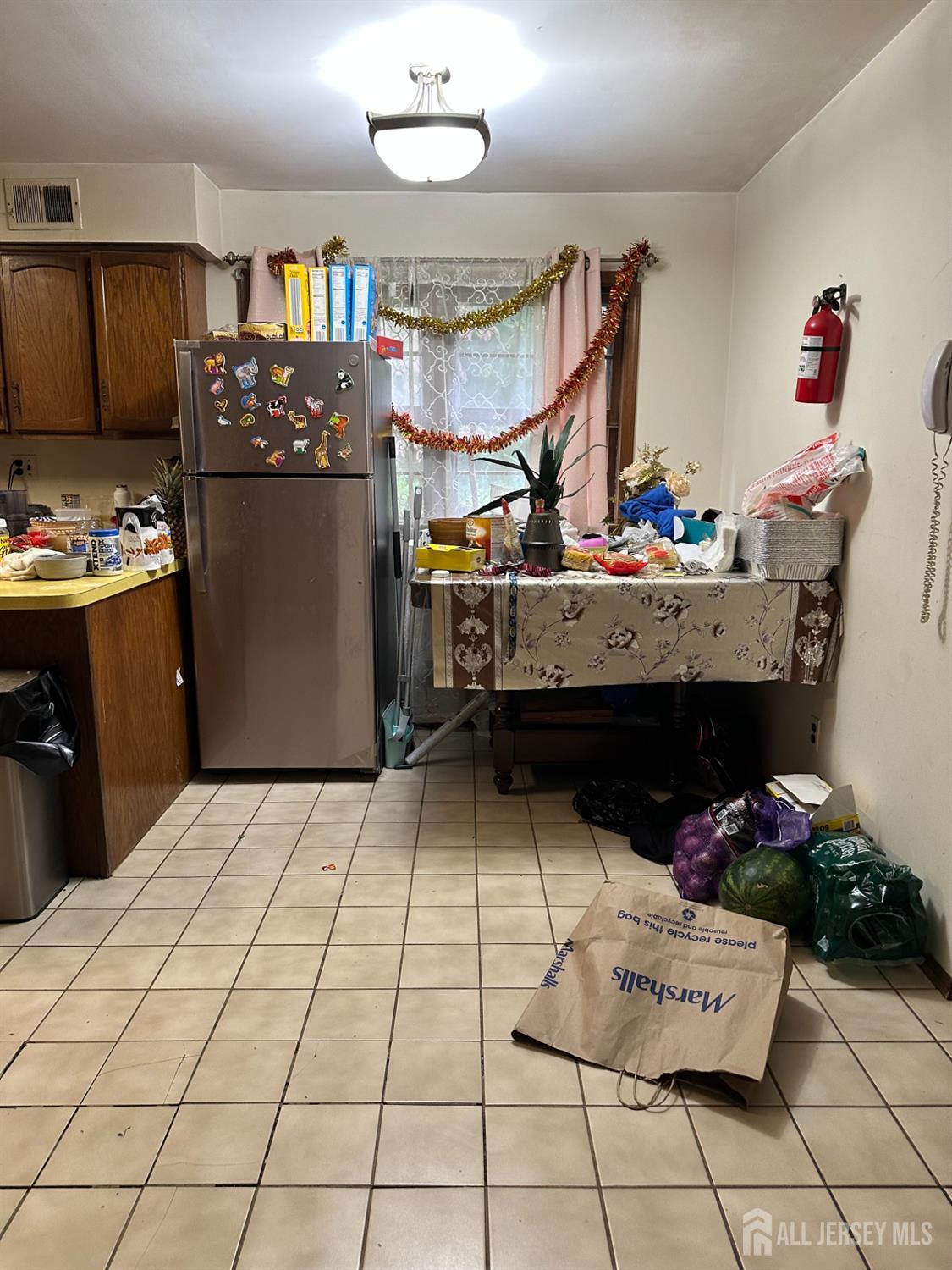 16 Hershey Road East Brunswick, NJ 08816 - Photo 7 of 15 a room with storage and utility