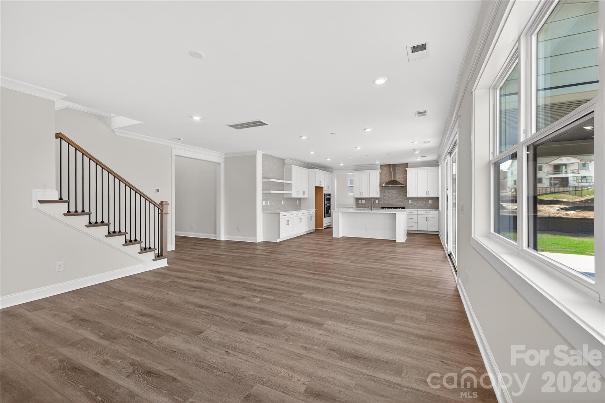 355 Linda Carol Lane Tega Cay, SC 29708 - Photo 7 of 15 a view of a living room with windows