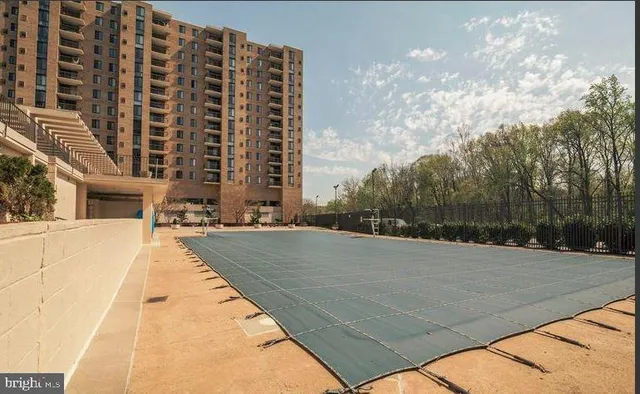 a view of building with yard