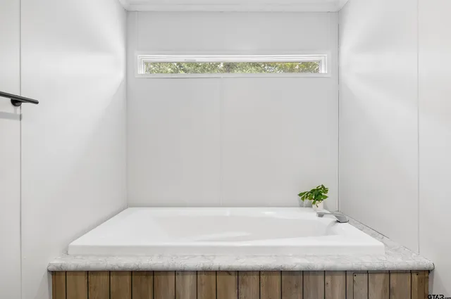 a bathroom with a bathtub