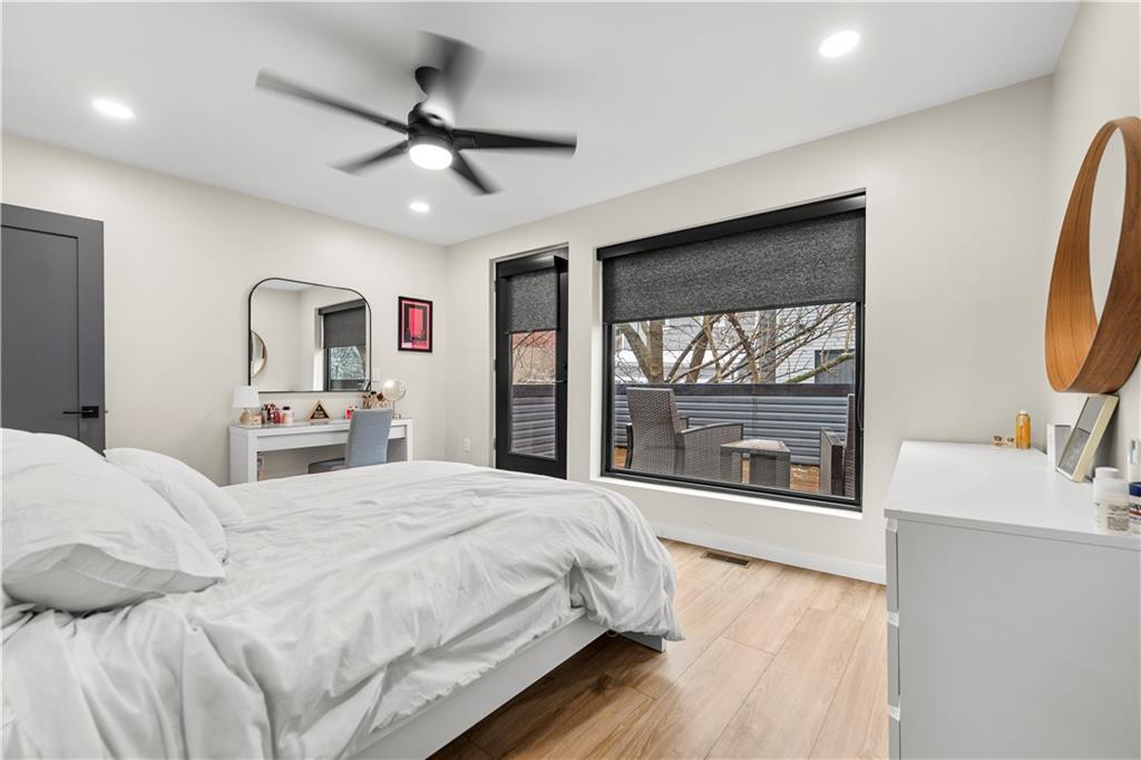 5322 Kent Way Pittsburgh, PA 15201 - Photo 14 of 24 a bedroom with a large bed and a large window
