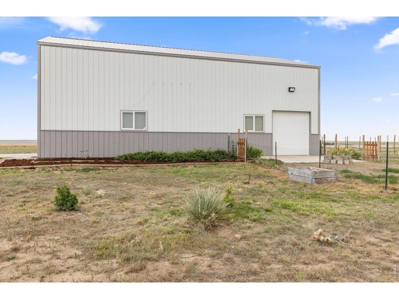 13550 Deter-Winters Road Byers, CO 80103 - Photo 24 of 50 the 8' overhead west facing door can also accommodate extra vehicle access into the barn