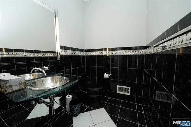 a bathroom with a sink and a toilet