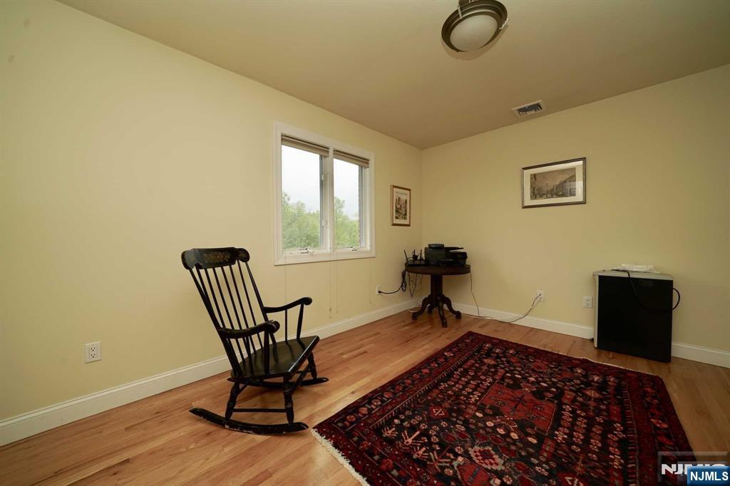 1 Candlewood Drive, Unit 1 Old Tappan, NJ 07675 - Photo 20 of 27 a view of a workspace with furniture and a window