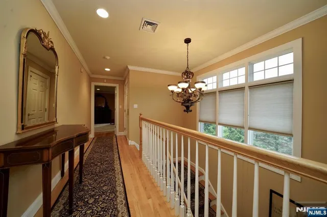 a view of a balcony with chandelier
