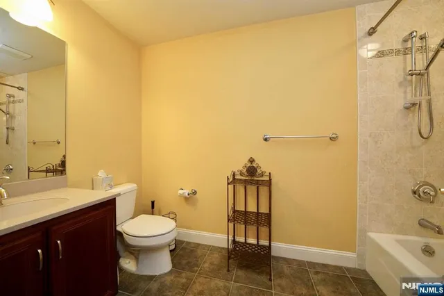 a bathroom with a sink and a toilet