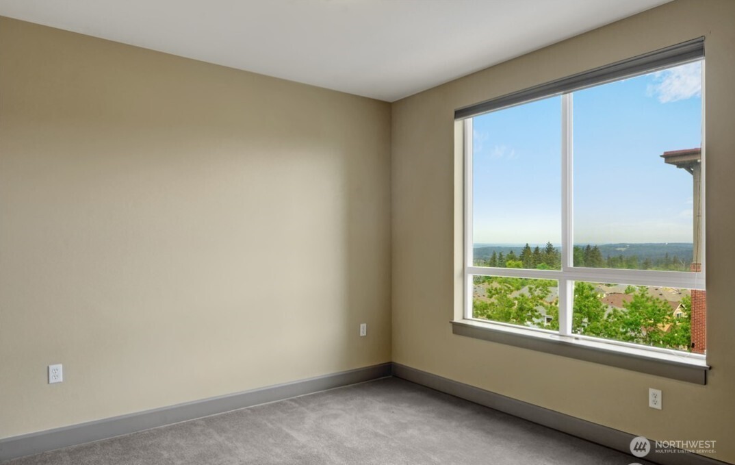 1840 25th Avenue Northeast, Unit 405 Issaquah, WA 98029 - Photo 11 of 20 an empty room with a window