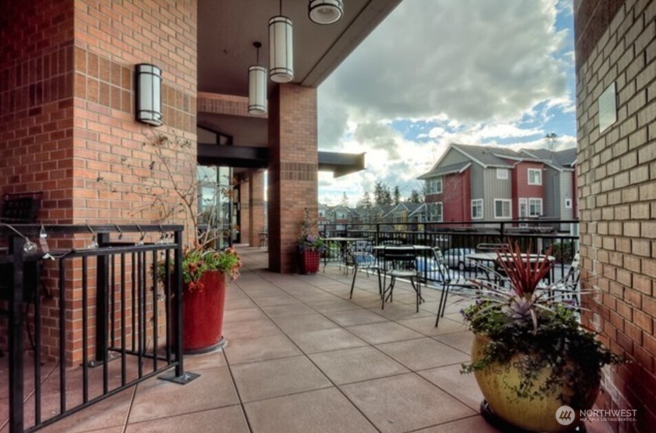 1840 25th Avenue Northeast, Unit 405 Issaquah, WA 98029 - Photo 17 of 20 a view of a building with sitting area