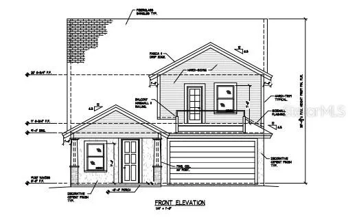 a view of a white house with large windows