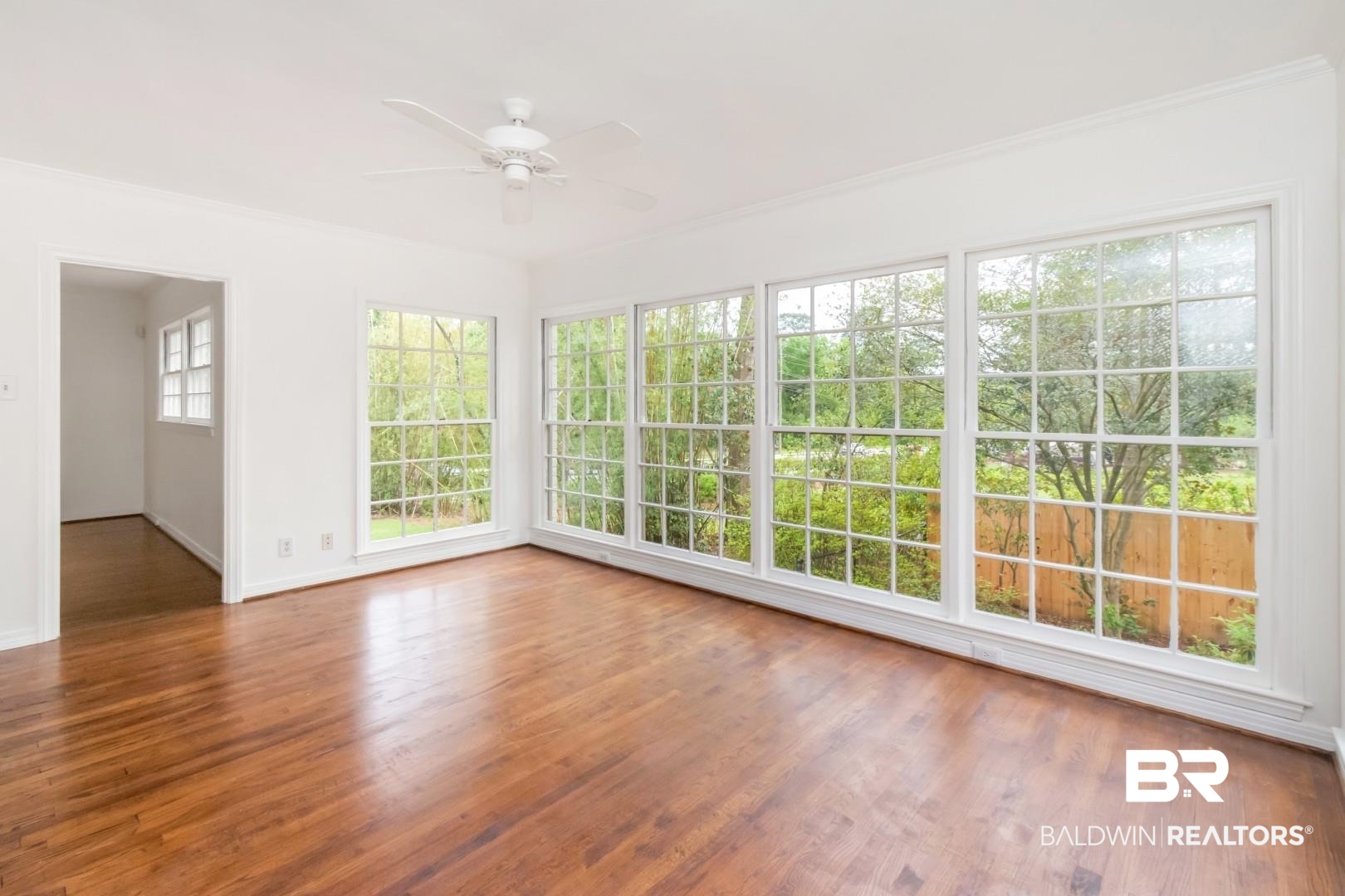4 Turnout Lane Mobile, AL 36608 - Photo 20 of 53 Unfurnished sunroom with wood finished floors and ornamental molding