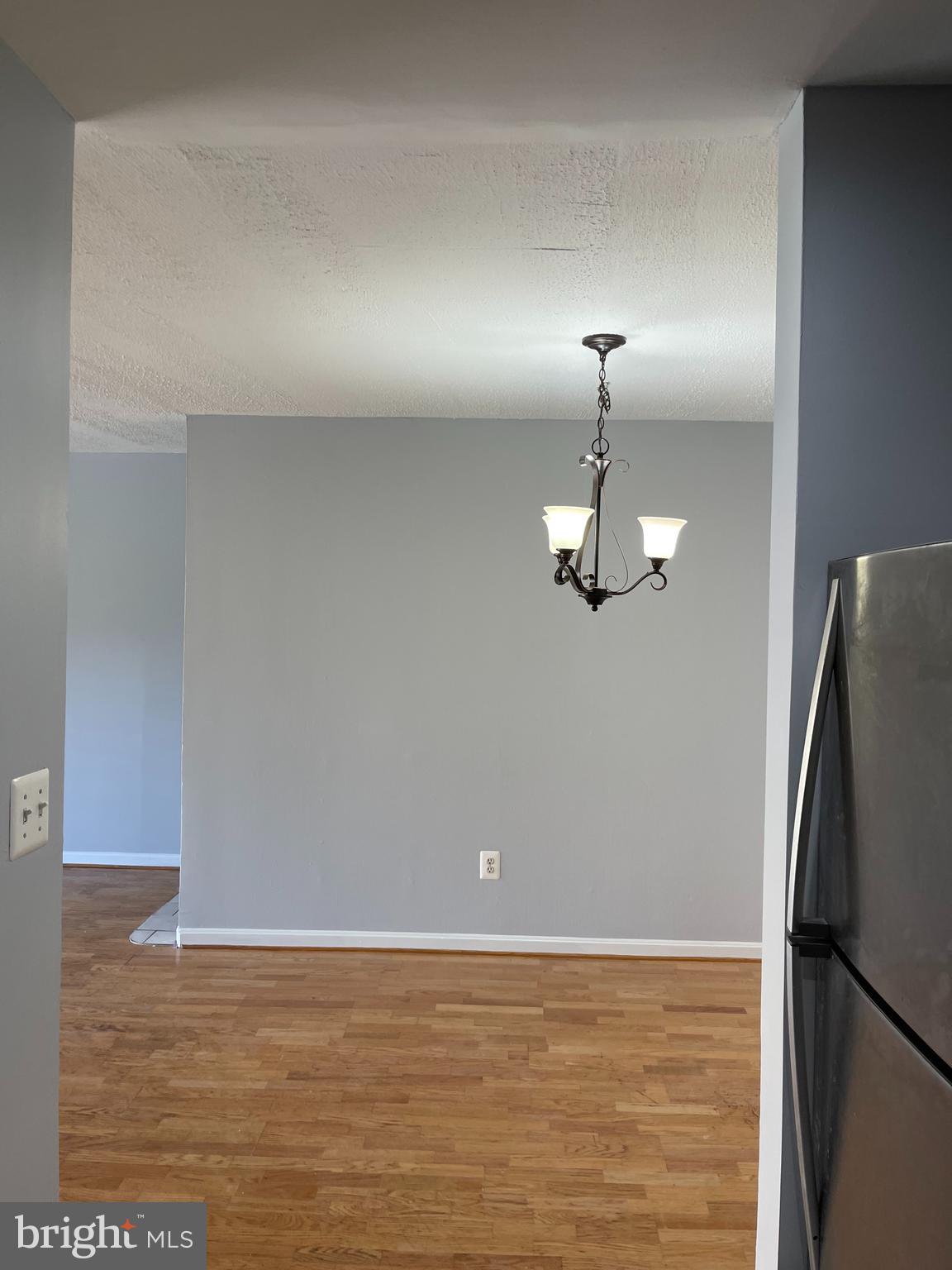 5106 F Street Southeast, Unit 8 Washington, DC 20019 - Photo 14 of 39 a view of a livingroom with wooden floor