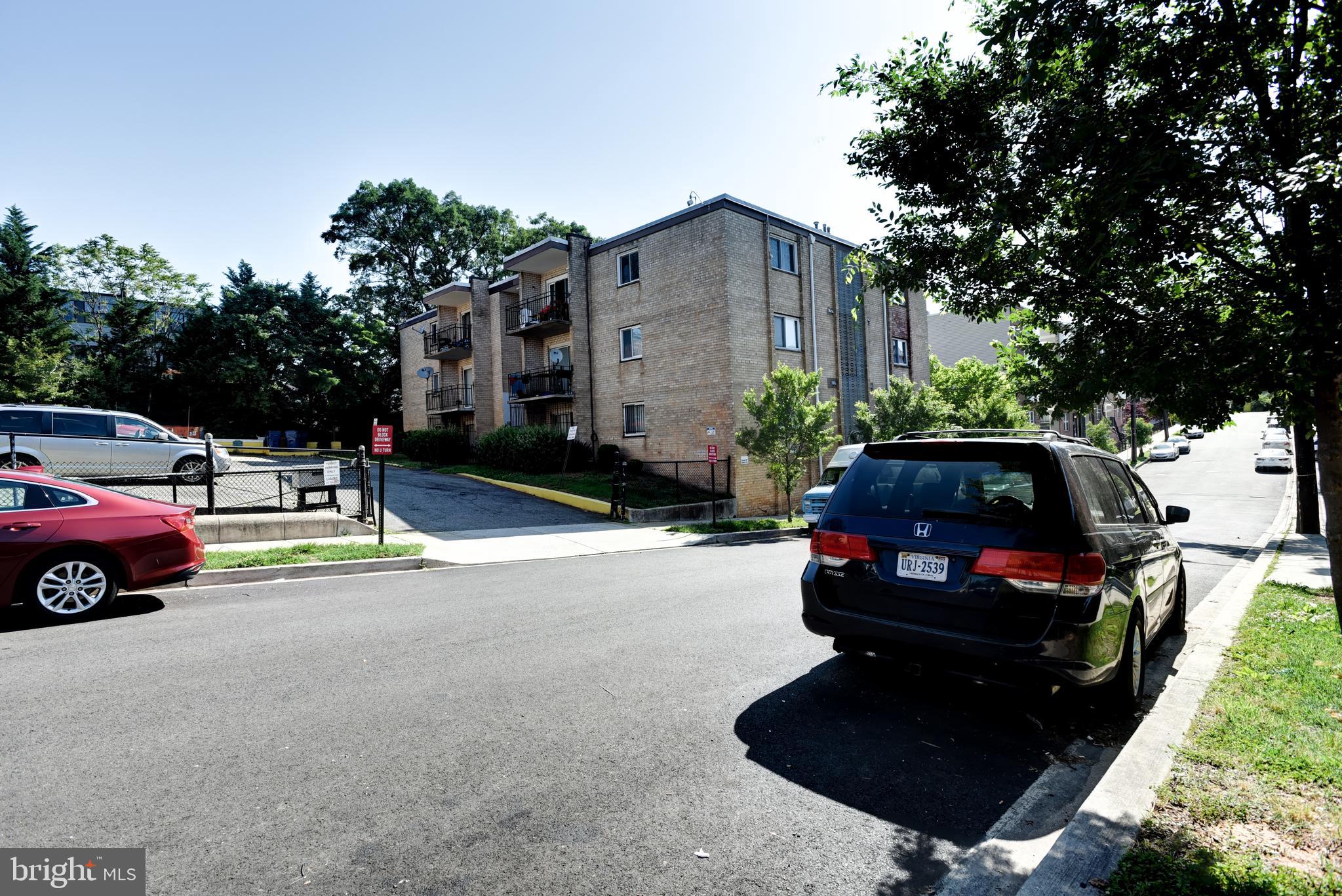 5106 F Street Southeast, Unit 8 Washington, DC 20019 - Photo 33 of 39 a view of street with parked cars