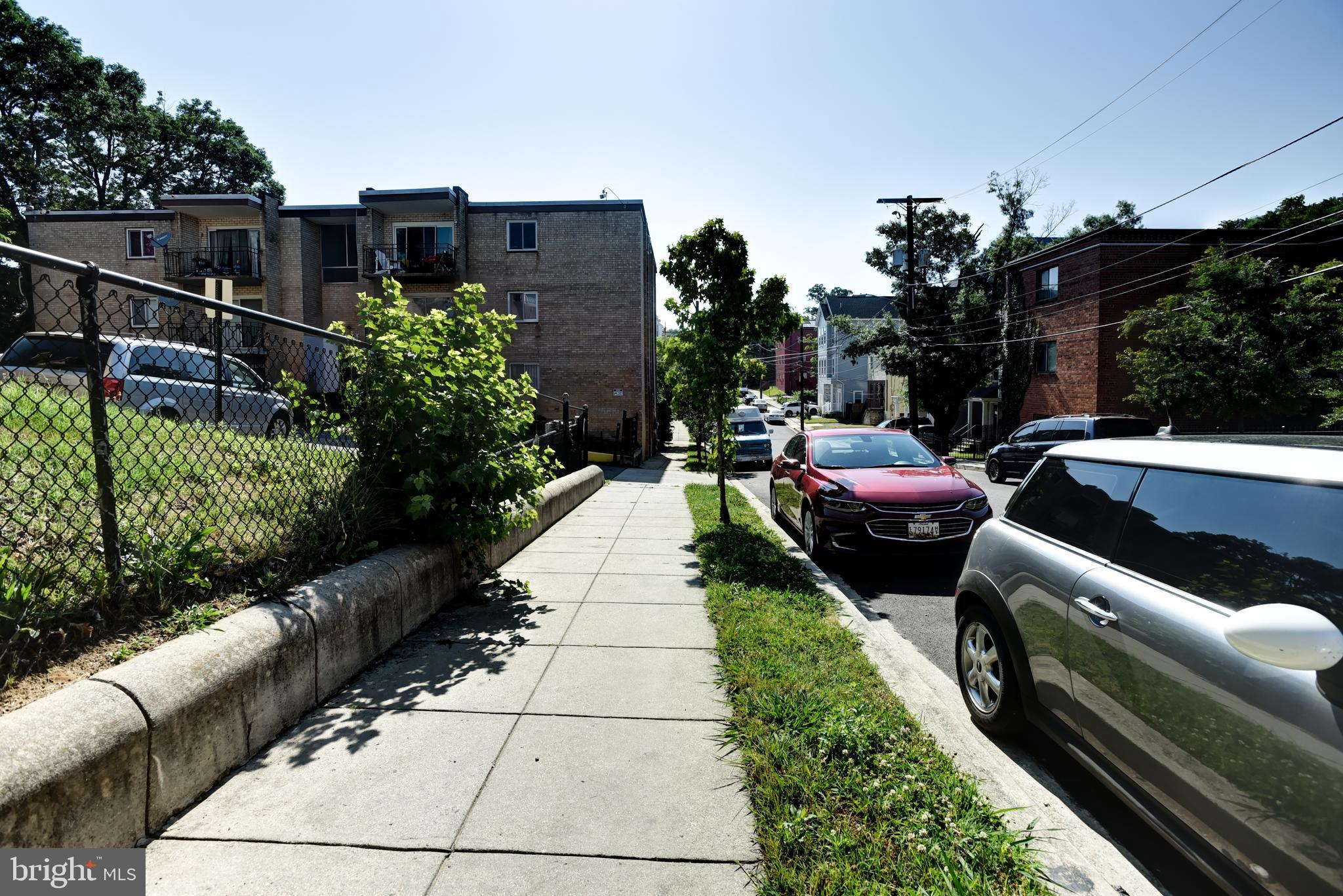 5106 F Street Southeast, Unit 8 Washington, DC 20019 - Photo 37 of 39 a view of a backyard with sitting area