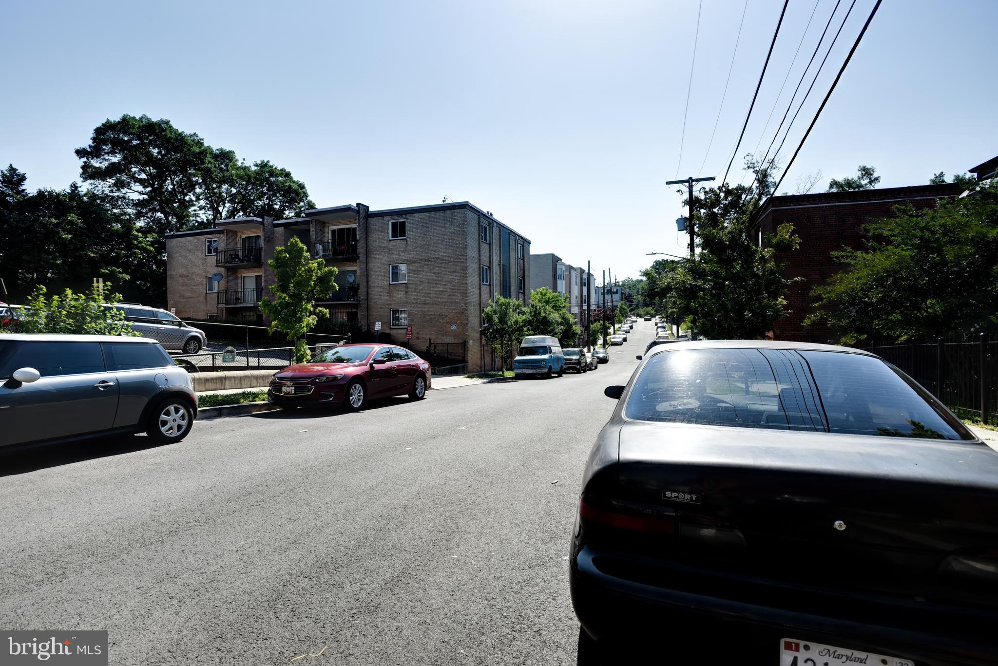 5106 F Street Southeast, Unit 8 Washington, DC 20019 - Photo 38 of 39 a view of street with parked cars