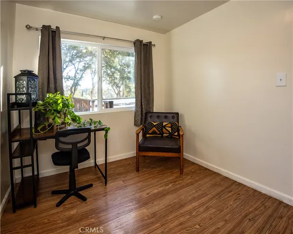 a room with furniture and a window