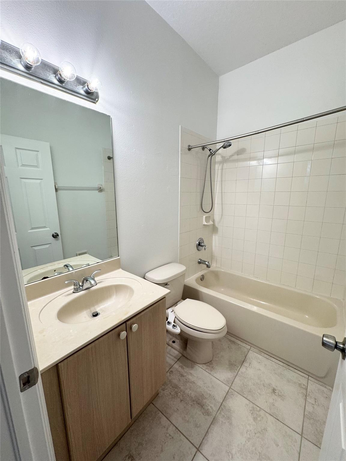 4903 Southwest 140th Terrace Miramar, FL 33027 - Photo 11 of 19 a bathroom with a sink a toilet and shower