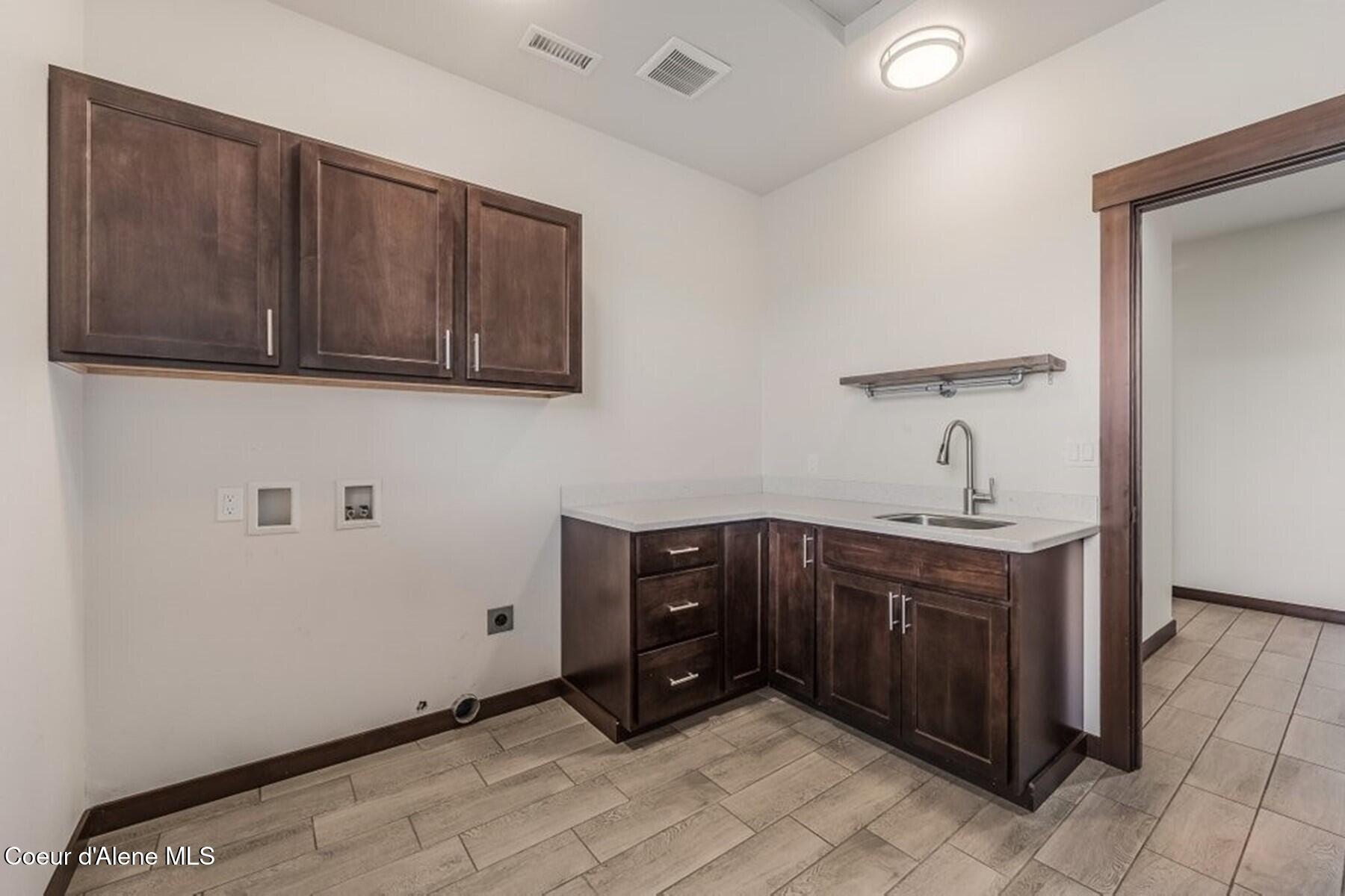 455 Solar Road Oldtown, ID 83822 - Photo 44 of 52 Utility Sink and Storage Space