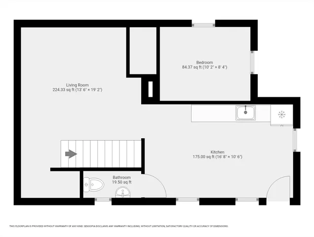 a black and white photo of a living room