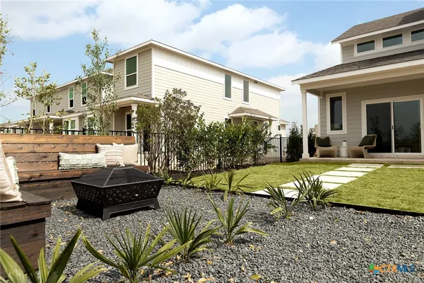 a front view of a house with swimming pool