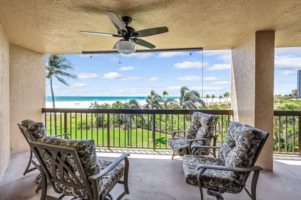 a patio with water view and a ocean view