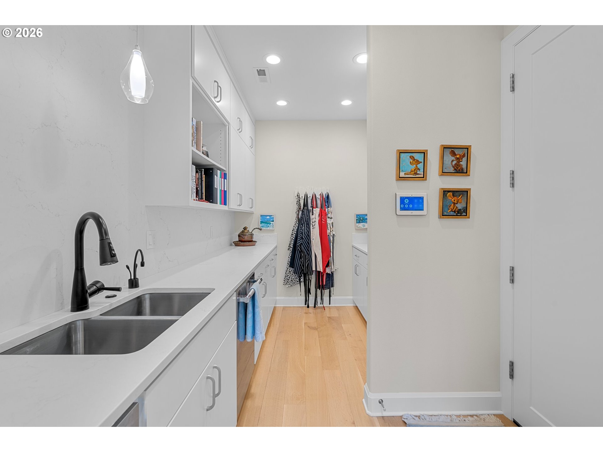1716 Northwest Mill Pond Road Portland, OR 97229 - Photo 16 of 48 a bathroom with a sink and mirror