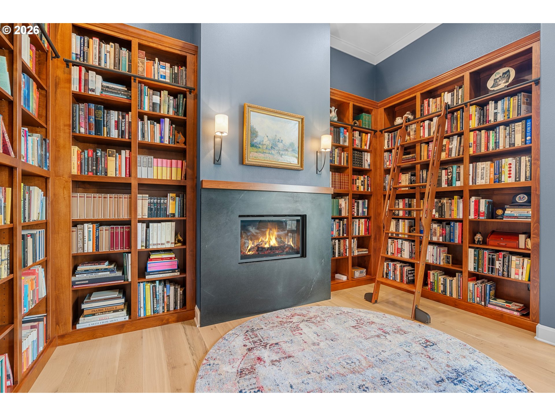 1716 Northwest Mill Pond Road Portland, OR 97229 - Photo 22 of 48 a bedroom with a large book shelf and a book shelf