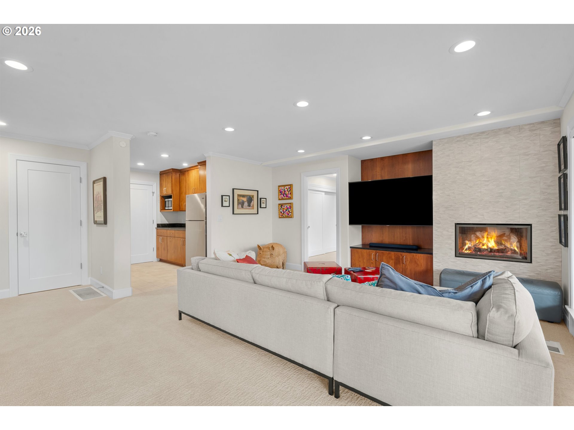 1716 Northwest Mill Pond Road Portland, OR 97229 - Photo 31 of 48 a living room with furniture and a flat screen tv