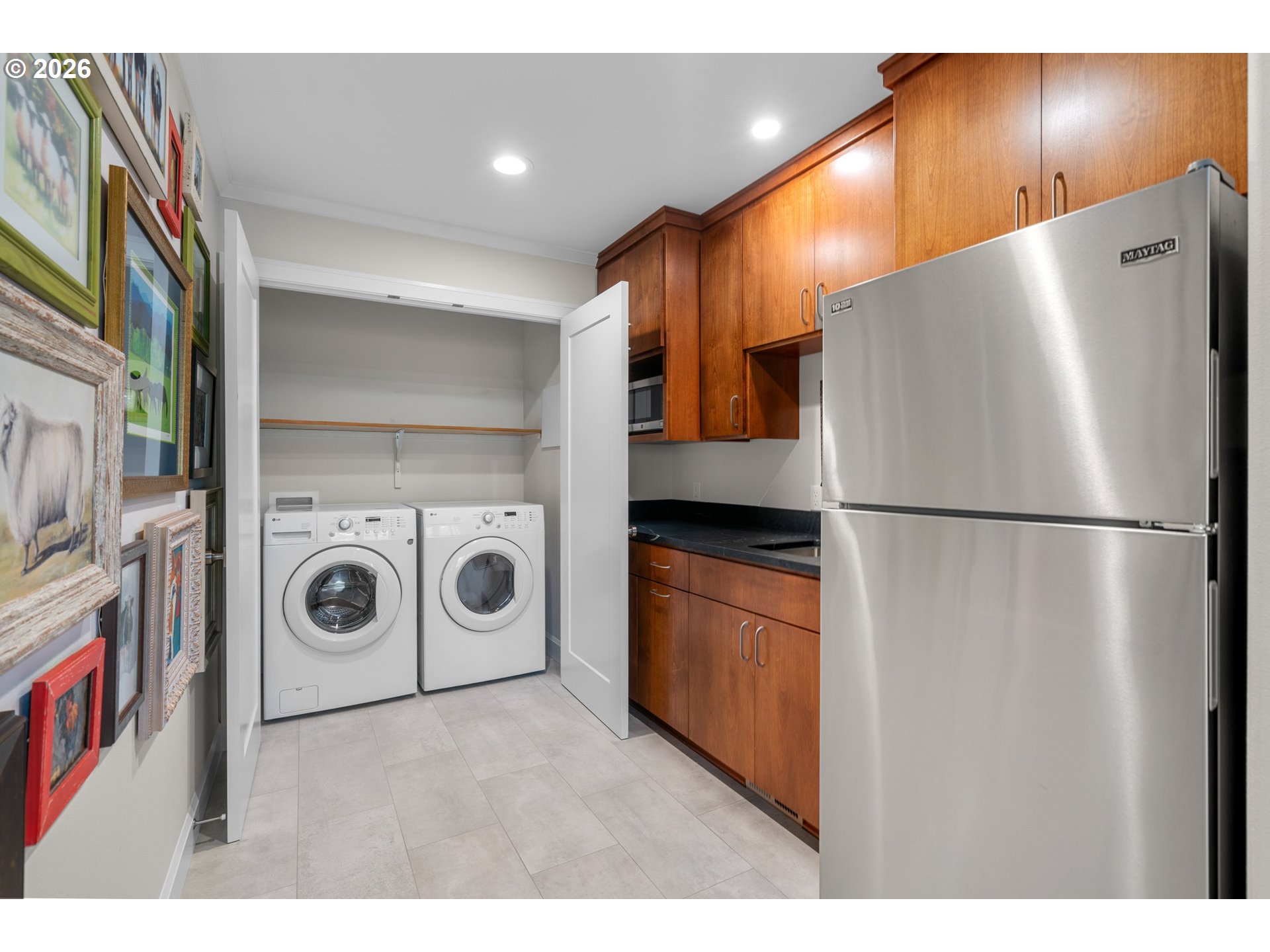 1716 Northwest Mill Pond Road Portland, OR 97229 - Photo 32 of 48 a utility room with dryer and washer