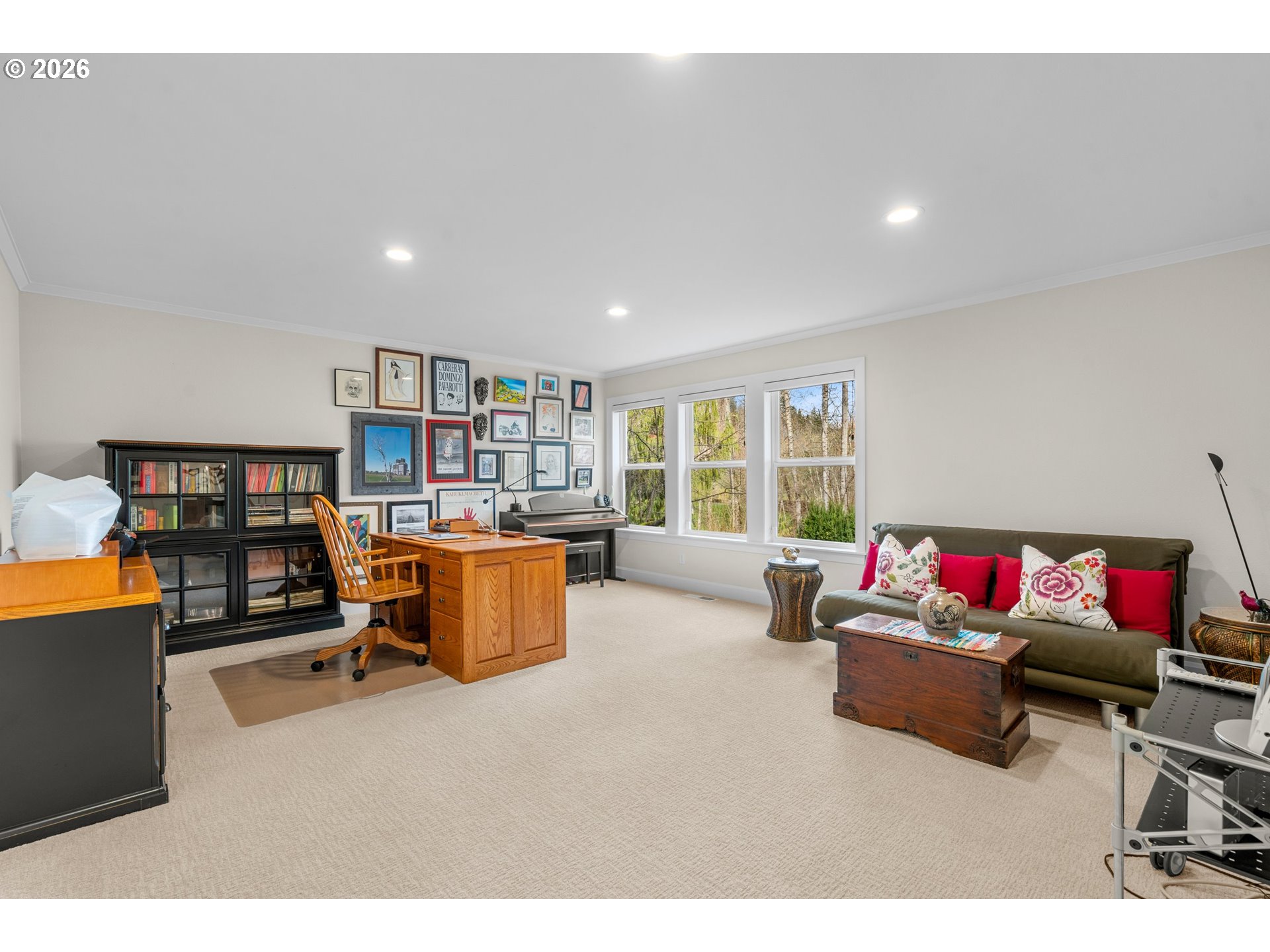 1716 Northwest Mill Pond Road Portland, OR 97229 - Photo 34 of 48 a living room with furniture and a flat screen tv