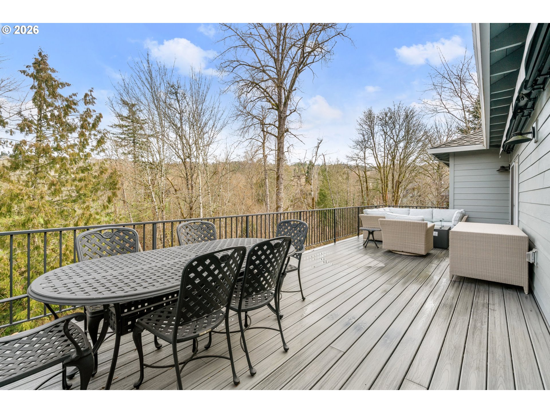 1716 Northwest Mill Pond Road Portland, OR 97229 - Photo 41 of 48 a view of balcony with furniture and wooden floor