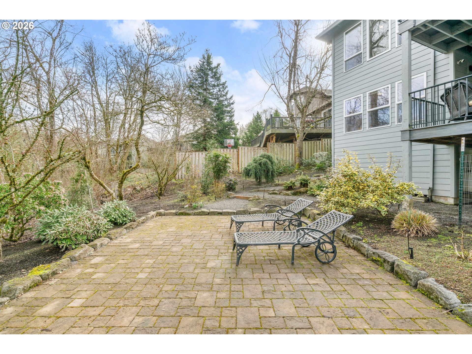 1716 Northwest Mill Pond Road Portland, OR 97229 - Photo 44 of 48 a view of a patio with table and chairs and potted plants