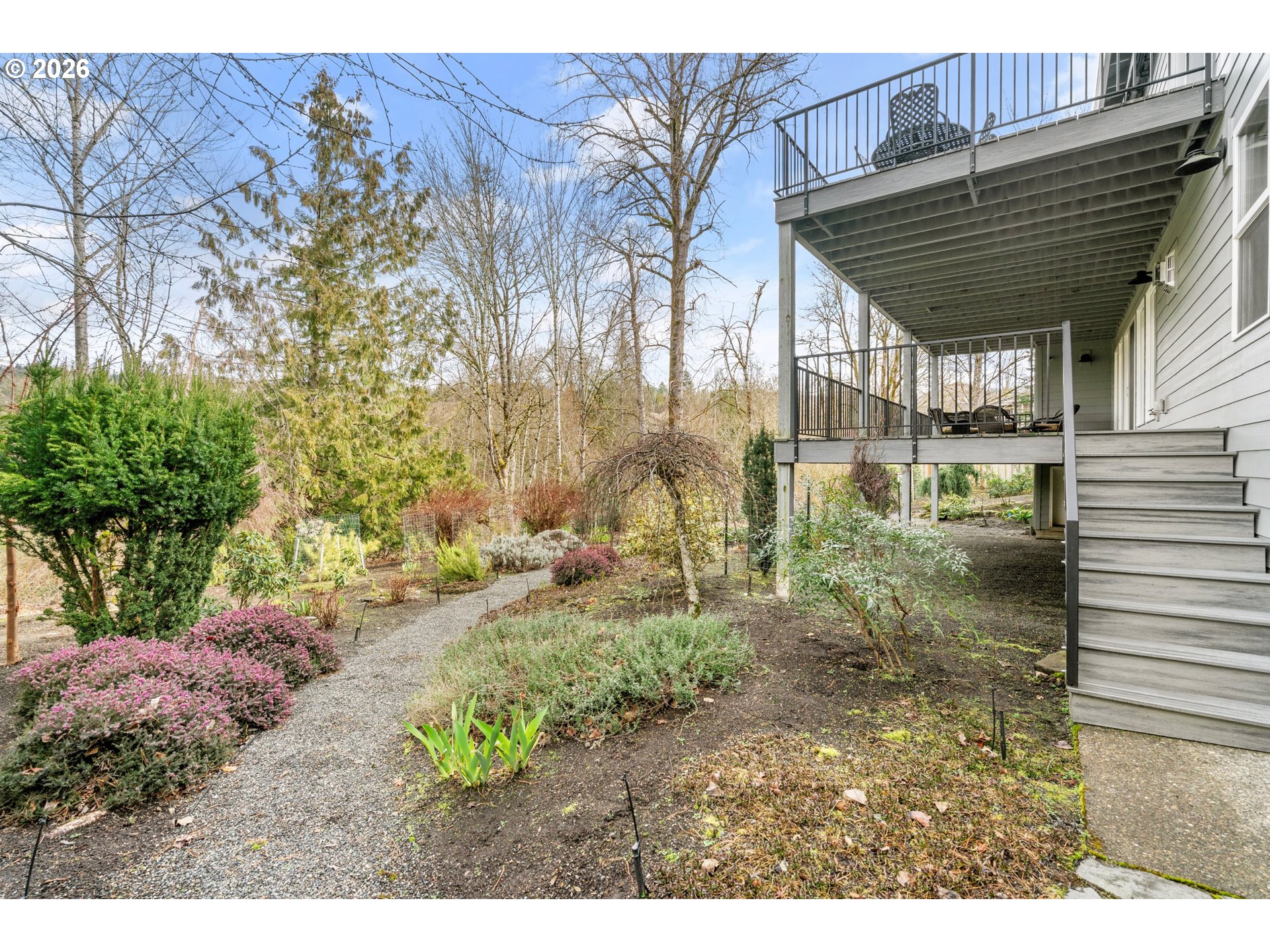 1716 Northwest Mill Pond Road Portland, OR 97229 - Photo 45 of 48 a backyard of a house with a yard and outdoor seating