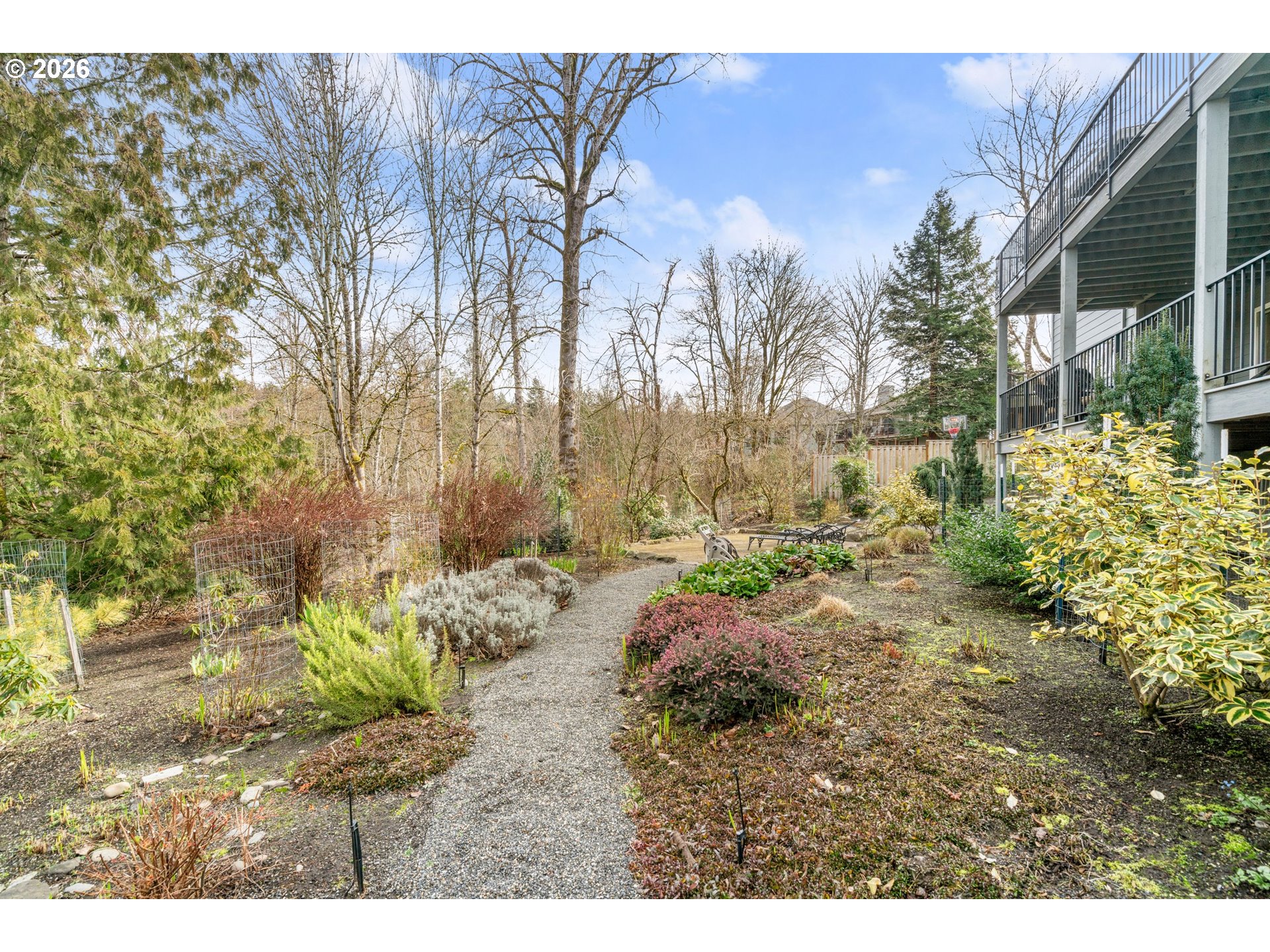 1716 Northwest Mill Pond Road Portland, OR 97229 - Photo 46 of 48 a backyard of a house with a yard and outdoor seating