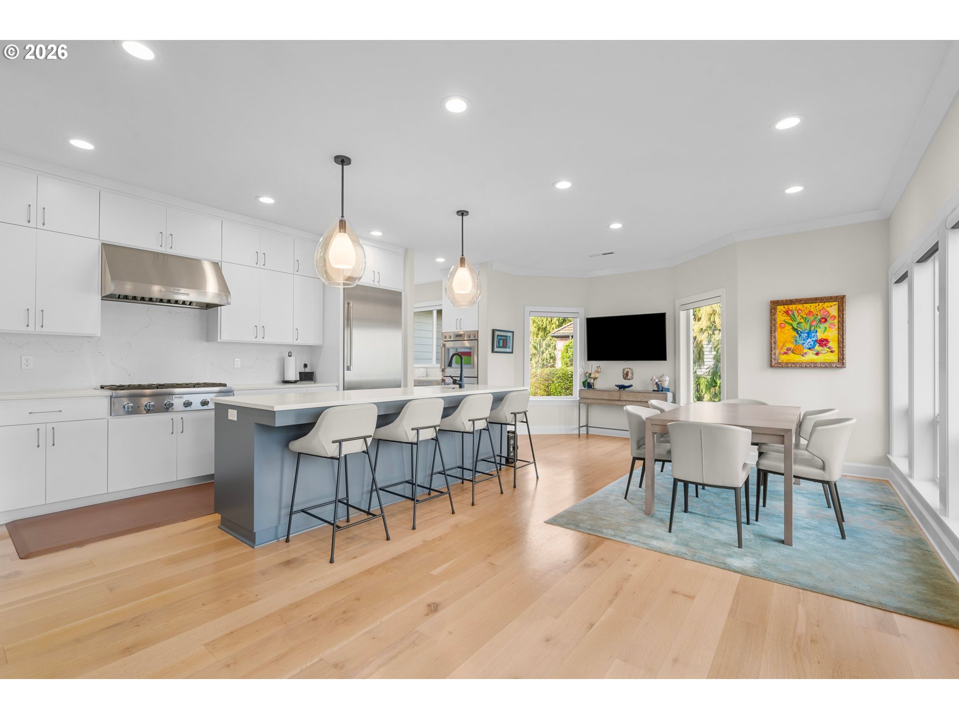1716 Northwest Mill Pond Road Portland, OR 97229 - Photo 9 of 48 a large kitchen with a table and chairs