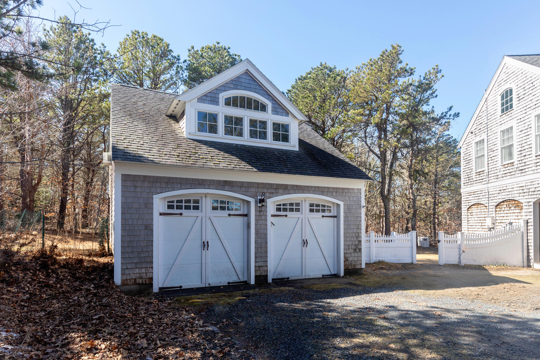 311 South Sunken Meadow Road Eastham, MA 02642 - Photo 7 of 57 a front view of a house with a yard