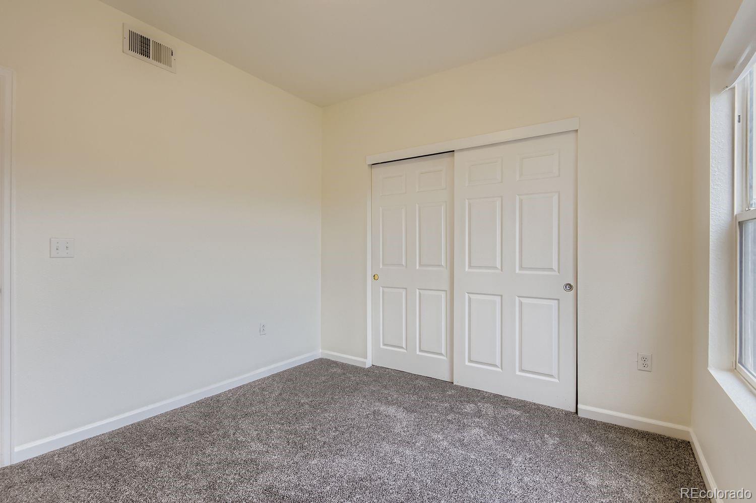 3261 South Waco Court, Unit B Aurora, CO 80013 - Photo 14 of 21 a view of an empty room