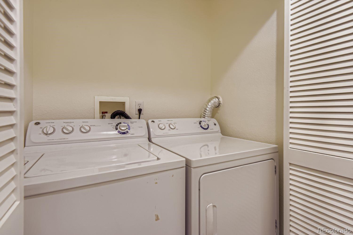 3261 South Waco Court, Unit B Aurora, CO 80013 - Photo 16 of 21 a utility room with dryer and washer
