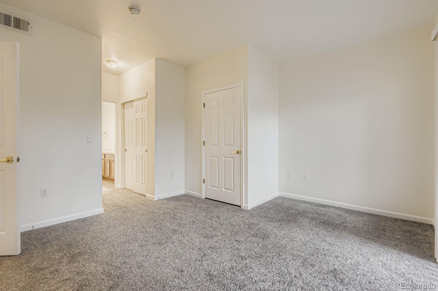 3261 South Waco Court, Unit B Aurora, CO 80013 - Photo 9 of 21 a view of an empty room