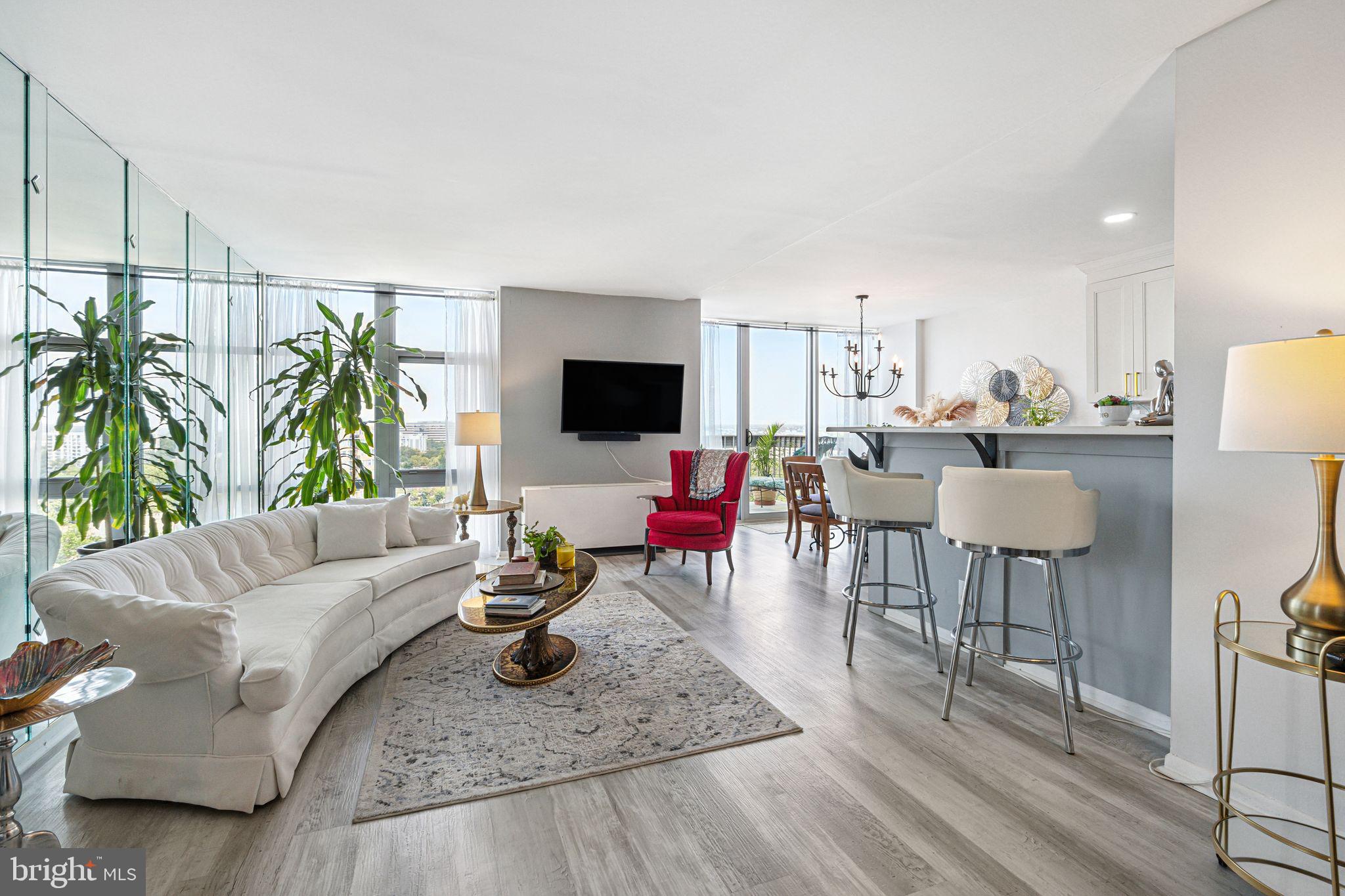 3600 Conshohocken Avenue, Unit 1712 Philadelphia, PA 19131 - Photo 1 of 27 a living room with furniture and a flat screen tv
